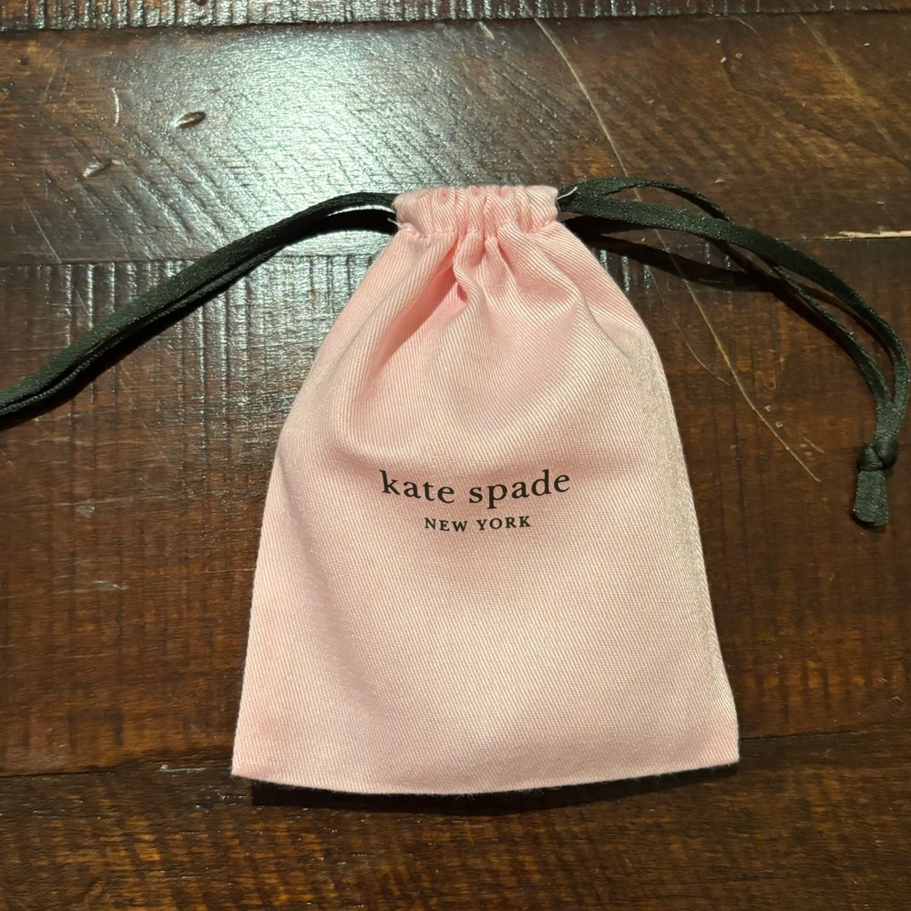 Kate Spade Pink Pouch with Heart Bracelet